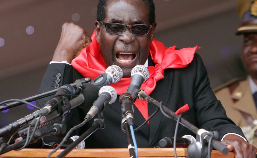 Zimbabwe's President Robert Mugabe delivers his speech during celebrations to mark his 90th birthday in Marondera about 100 kilometres east of Harare, Sunday, Feb. 23, 2014. Mugabe who is Africa's oldest leader has been in power in the Southern African nation since 1980. (AP (AP Photo/Tsvangirayi Mukwazhi)