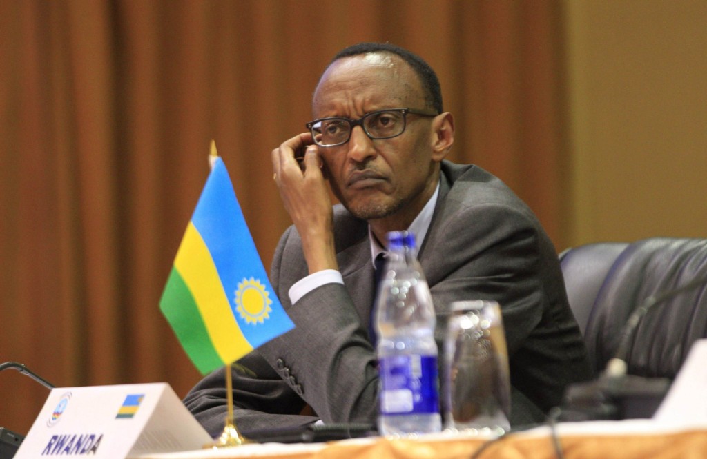 Rwanda's President Paul Kagame attends the extraordinary summit of the International Conference on the Great Lakes Region (ICGLR) head of states emergency summit in Uganda's capital Kampala September 5, 2013. ICGLR members states condemned the resumption of hostility in eastern Congo and ordered the resumption of peace talks between M23 rebels and the Congo government to start in three days in Kampala. REUTERS/James Akena (UGANDA - Tags: POLITICS CIVIL UNREST CONFLICT)