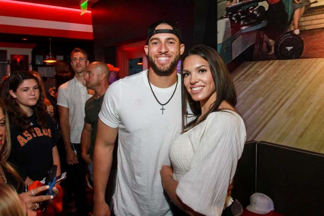 Family of George Springer. Left to right, father George Springer, Jr.,  sister Lena (holding Nicole's son, Bryce), fiancee C…