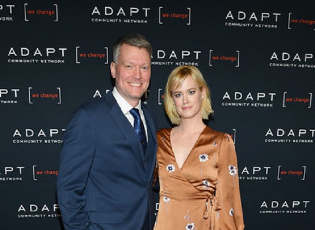 Abigail Hawk with friendly, Husband Bryan Spies 