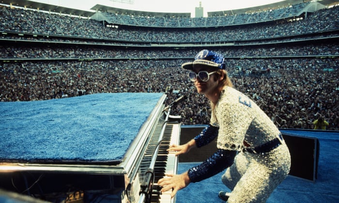 Elton John performs at Dodger Stadium in Los Angeles, 1975
